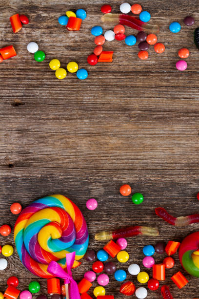 istock Colorful halloween candies on wood 1051435770