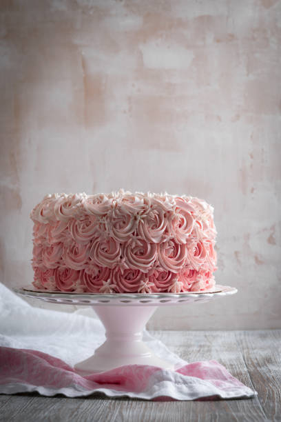 istock Pink Ombre Rose Cake. 1051438374