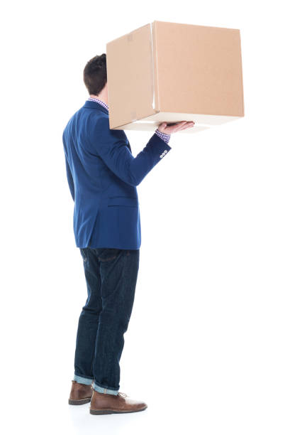 istock Businessman lifting a cardboard box with one hand 1051439380