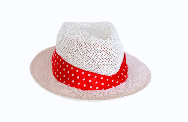 istock White summer hat with red ribbon, white background, copy space 1051439604