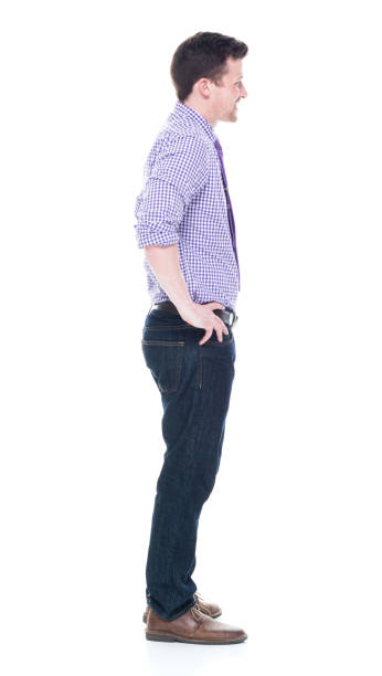istock Handsome businessman standing with hands on hips 1051442238