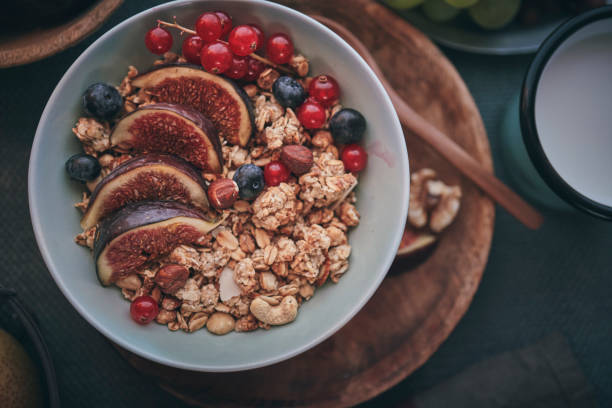 istock Healthy Muesli with Fresh Figs, Blueberries and Redcurrants for Breakfast 1051443058