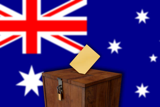 istock Australia flag with ballot box - elections 1051448396