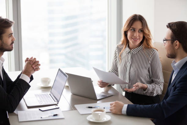 istock Business partners talk considering contract terms at briefing 1051453342