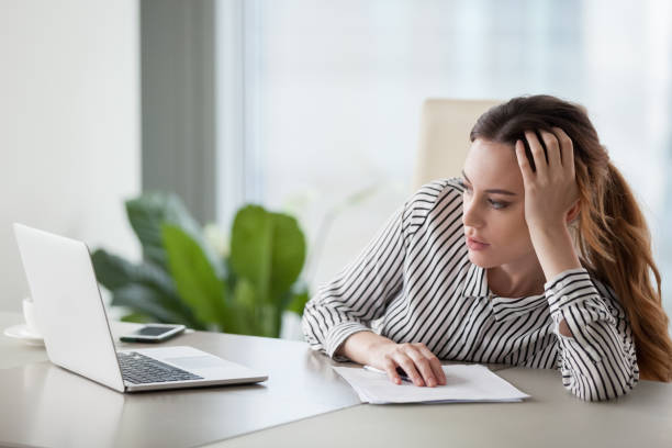 istock Bored woman worker feel unmotivated at work 1051453462