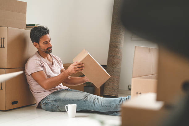 istock Man moving into a new house 1051453814