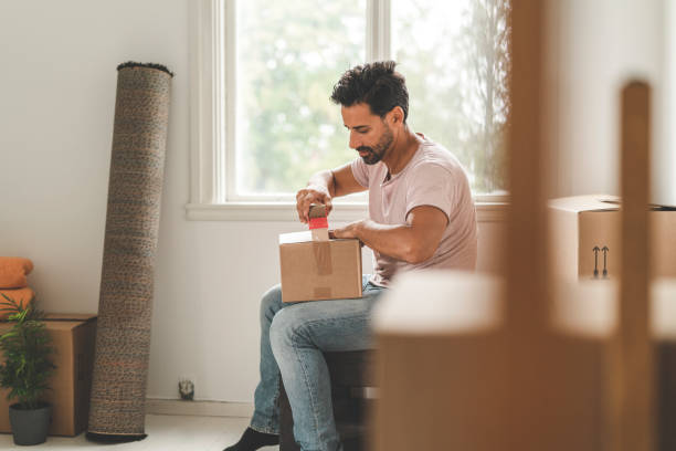 istock Man moving into a new house 1051453998