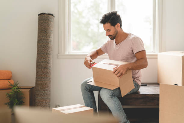 istock Man moving into a new house 1051454024