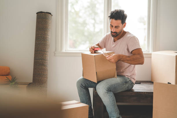 istock Man moving into a new house 1051454044