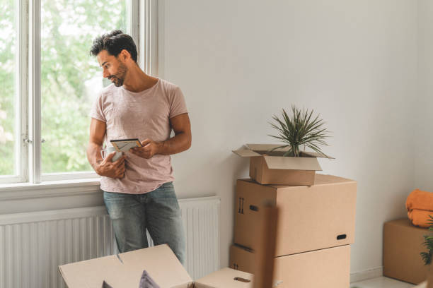 istock Man moving into a new house 1051454102