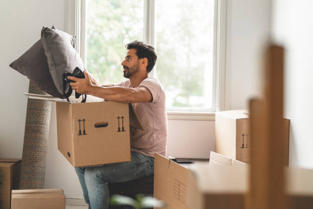 istock Man moving into a new house 1051454134