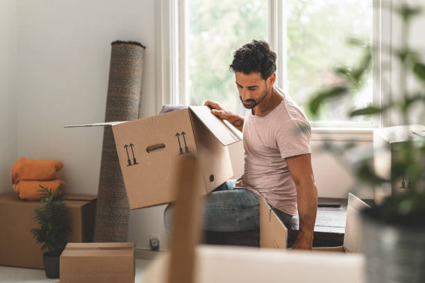 istock Man moving into a new house 1051454172
