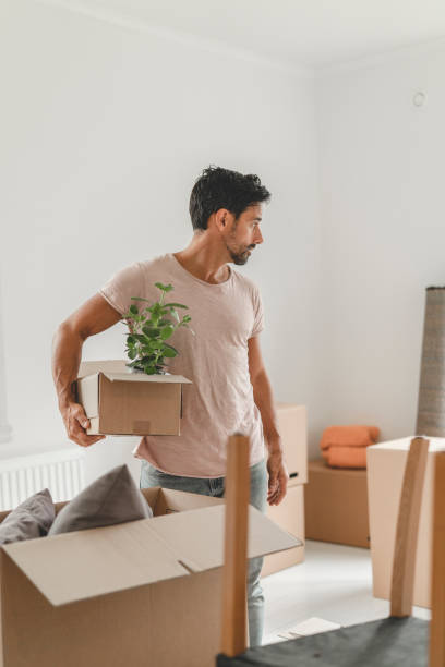 istock Man moving into a new house 1051454346