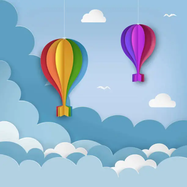 Vector illustration of Hanging paper craft hot air balloons, flying birds, clouds on the daytime sky background. Cloudy sky background. Minimal summertime scene. Paper hot air balloon garland with bows. Vector Illustration.