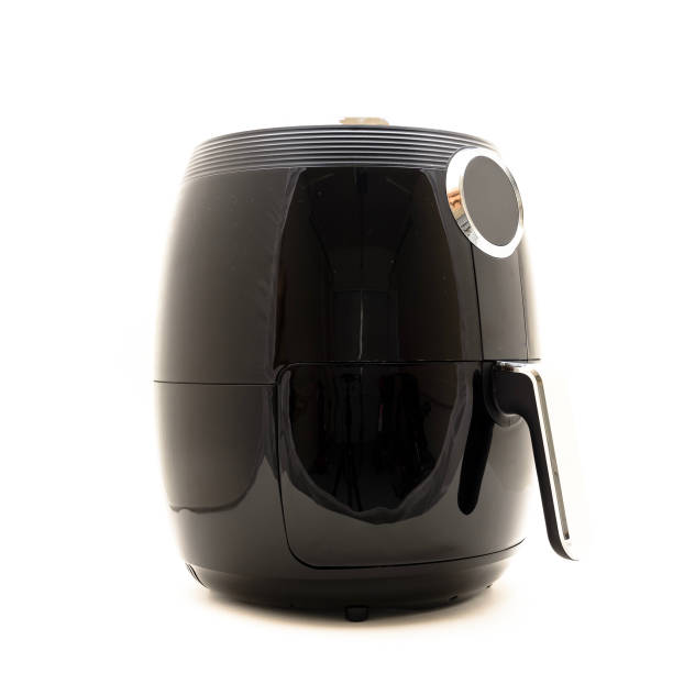 istock Close-up air fryer kitchen appliance isolated on white 1051469244