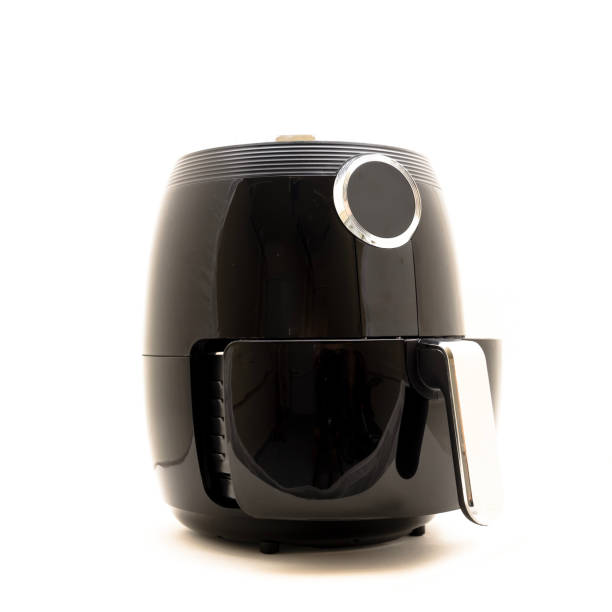 istock Studio shot air fryer with open basket isolated on white 1051469490