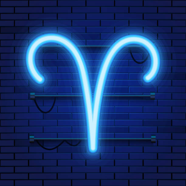 istock Blue shining cosmic neon zodiac Aries symbol on brick wall background. Astrology concept. 1051470284