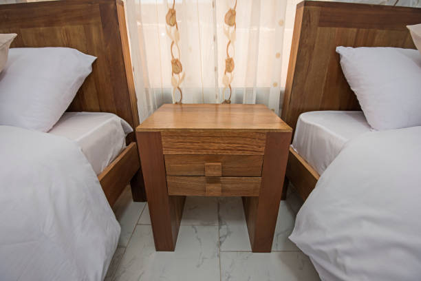 istock Interior design of bedroom in house with single beds 1051473080