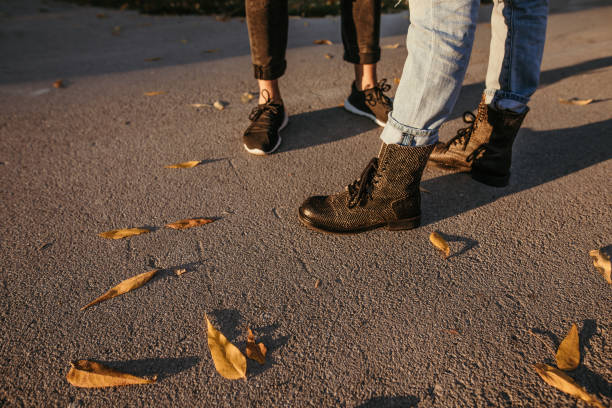 istock Couple in park in autumn posing 1051473160
