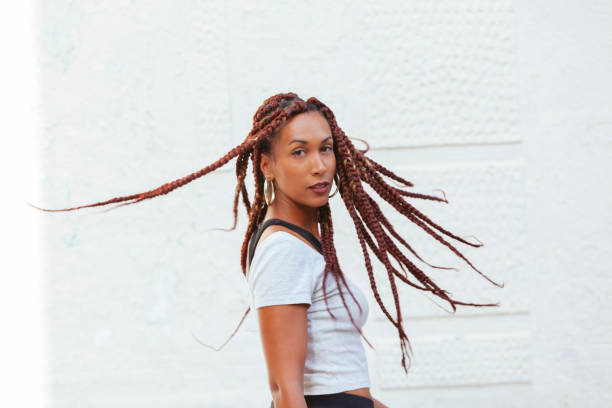 istock black woman with braids 1051478634