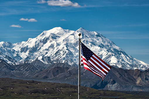 American Flag and Denali. This mountain was called Mt McKinley but that was changed and now it is Denali. This is the flag at the visitor’s center waaaay into the park.