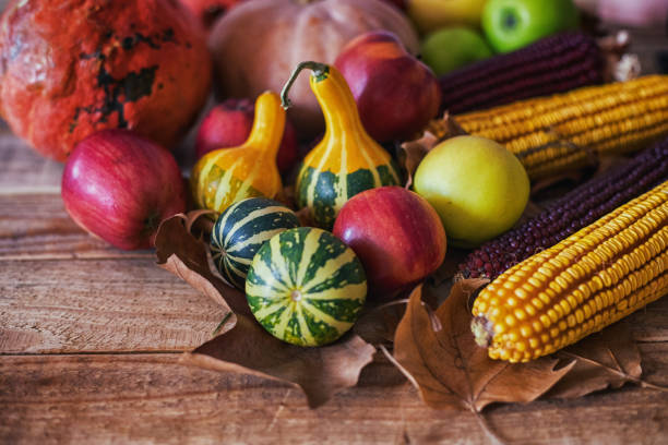Autumn fruits background at wood board. Close up, shot from above