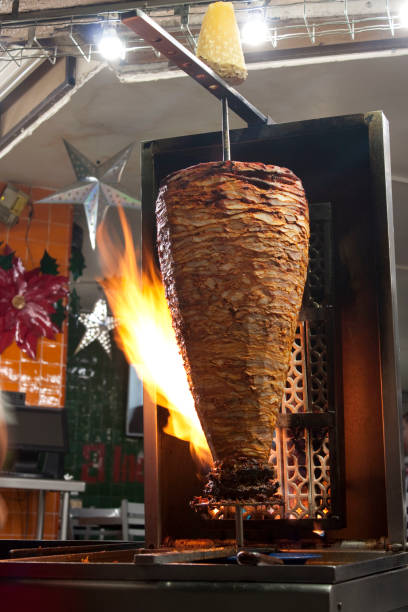 istock Pork meat cooked on a spit is a typical Mexican food. 1051496276
