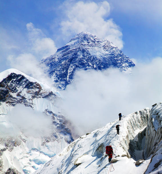 istock Mount Everest with group of climbers 1051499640