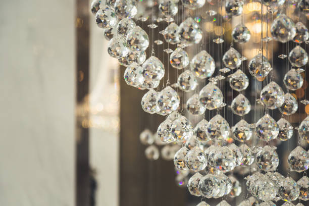 istock Crystal chandelier close-up. Glamour background with copy space 1051511204