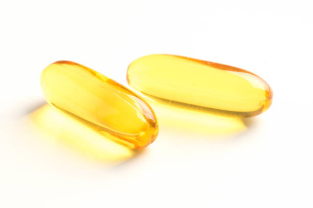 istock fish oil capsules isolated on white background 1051514368