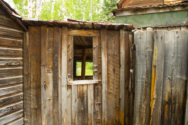 istock Weathered Barn Building and Fence 1051531850
