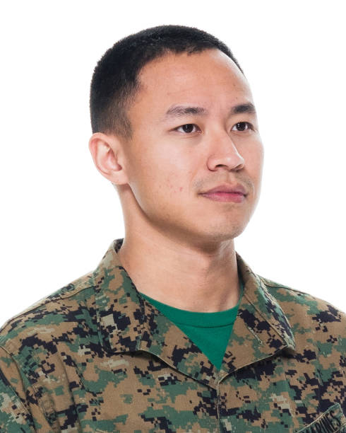 US Marine in uniform standing with hands by side