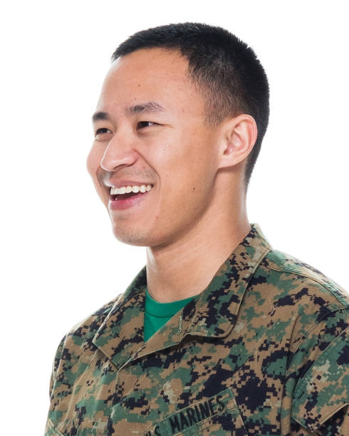 istock US Marine in uniform standing with hands by side 1051538294