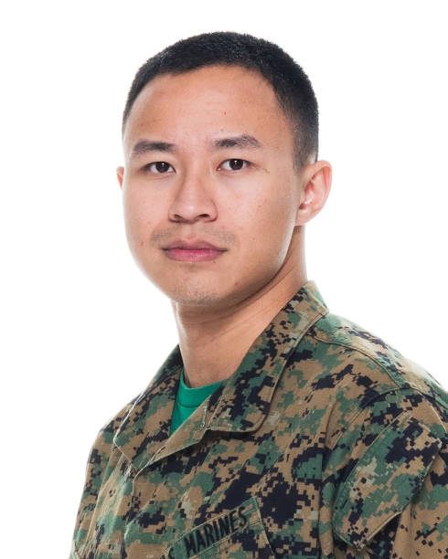 istock US Marine in uniform standing with hands by side 1051538298