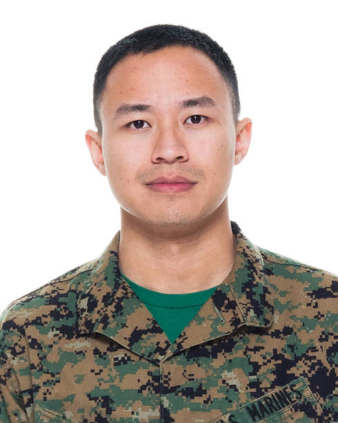 istock US Marine in uniform standing with hands by side 1051538322