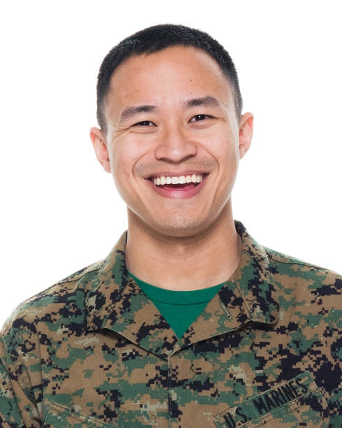 istock US Marine in uniform standing with hands by side 1051538326