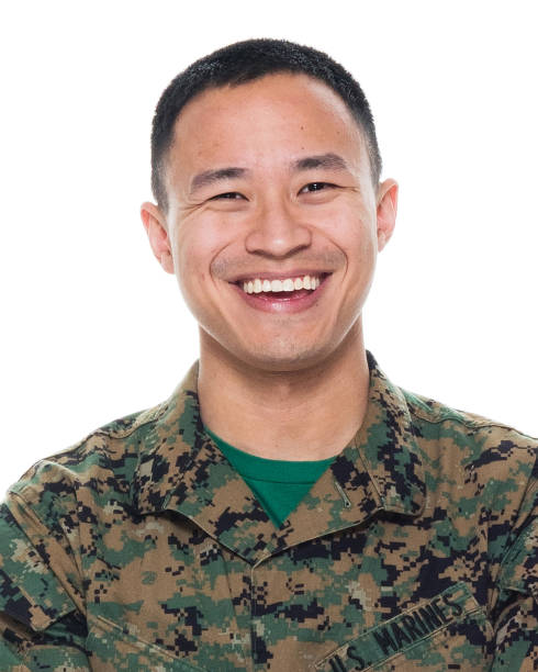 istock US Marine in uniform with arms crossed 1051538328
