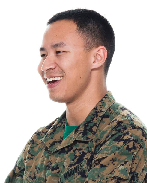 istock US Marine in uniform with arms crossed 1051538330