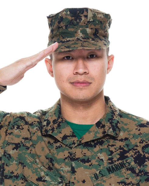 istock US Marine in uniform saluting 1051538364