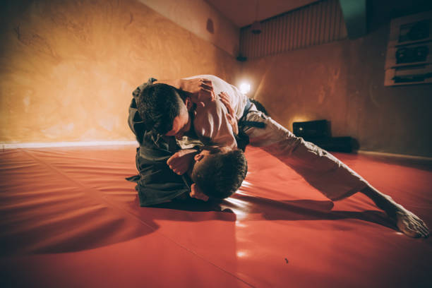 artes marciais de treino - wrestling mat - fotografias e filmes do acervo