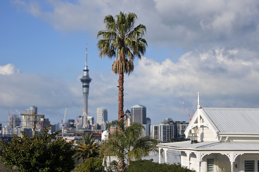 Victorian house against Auckland city skyline in Auckland New Zealand.