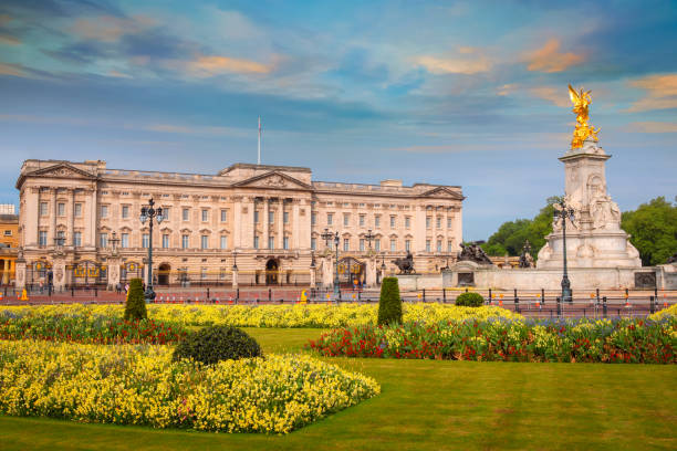 Buckingham Palace in London, UK London, UK - May 13 2018: Buckingham Palace is the London residence and administrative headquarters of the monarch of the United Kingdom, located in the City of Westminster buckingham palace photos stock pictures, royalty-free photos & images