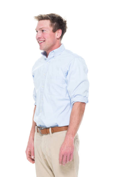 istock Attractive young male with hands by side 1051571812