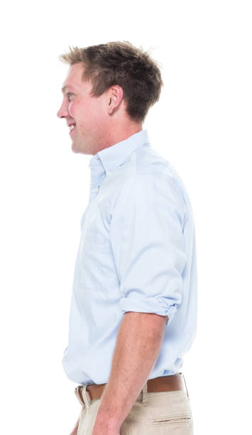 istock Attractive young male with hands by side 1051571816