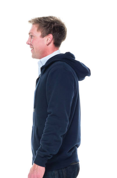 istock Attractive young male with hands by side 1051571884