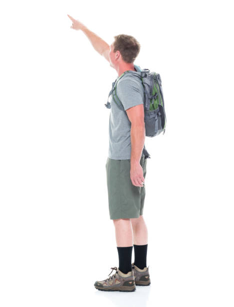 istock Friendly male hiker pointing upwards 1051575298