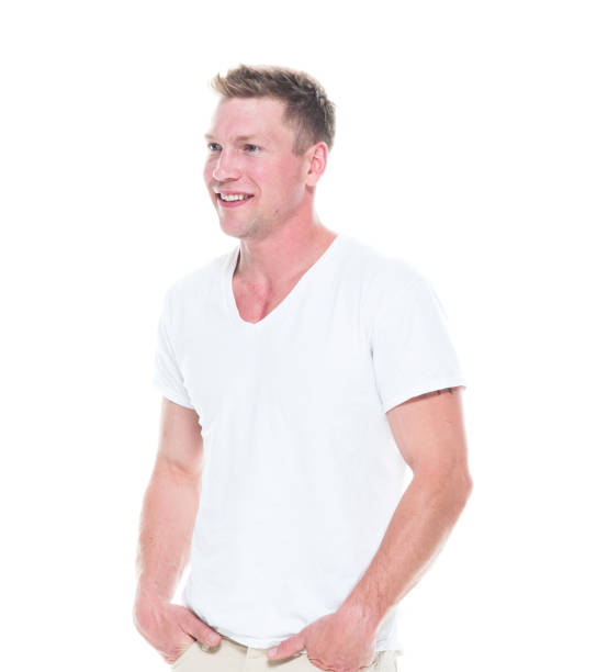istock Handsome man in shirt and shorts has hands in pocket 1051578506