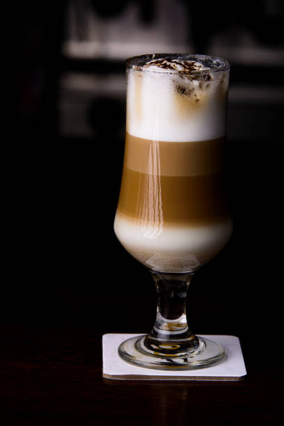 Cute design latte art with 3d effect, a shape of happy pussy cat served on a coffee table in a cafe