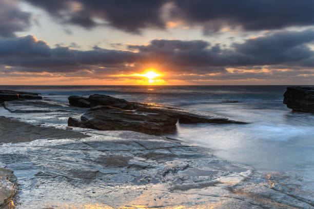 istock A Moody Sunrise Seascape 1051605418