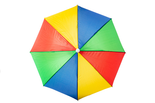 Summer vacation concept. Beach umbrella multicolour,  isolated on a white background